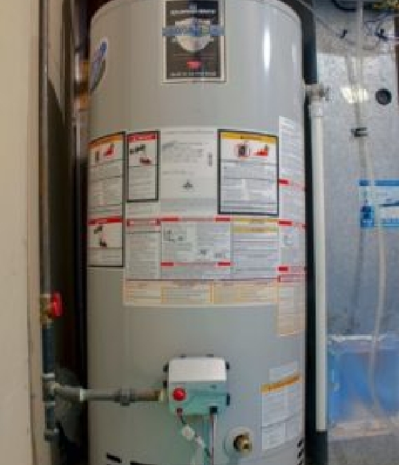 A water heater with stickers on it