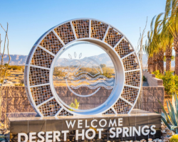 A sign that says welcome to desert hot springs.