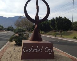 A monument that says cathedral city on it.